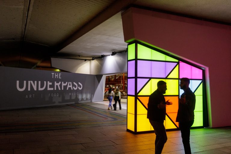 The Underpass: colourful glowing geometric light installation in a Birmingham underpass