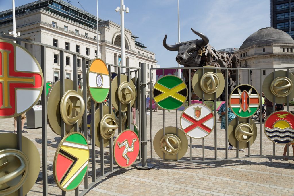 Flags Of Nations Badge Exchange: Commonwealth flag discs on railings in Centenary Square, Birmingham