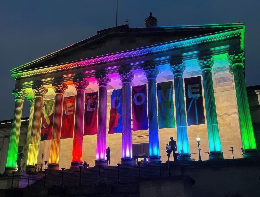 Uplight: UCL Portico lit in rainbow colours, London