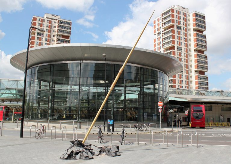 Gift Of The Gods: Javelin: giant golden javelin sculpture at Canada Water, London