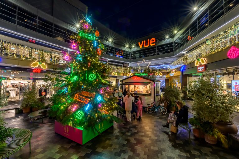 Holly Jolly Christmas: colourful Christmas tree and festive hut at Angel Central, London