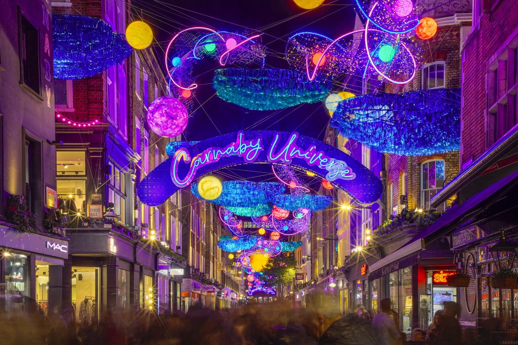 Carnaby Universe: glowing planets and sea creatures above Carnaby Street, London