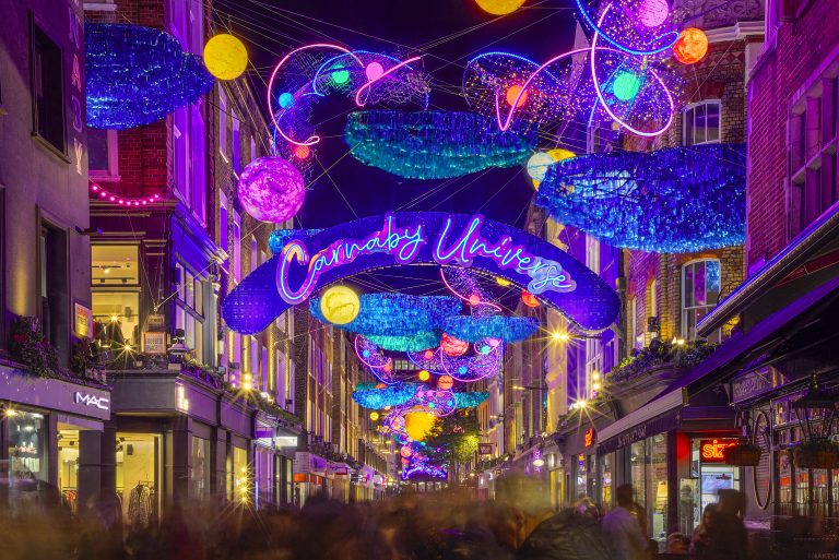 Carnaby Universe: glowing planets and sea creatures above Carnaby Street, London
