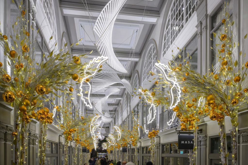 Quadrant Arcade Christmas decorations of gold foliage and white light sculptures, Soho, London
