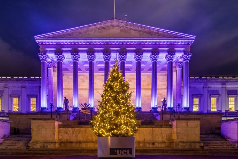 Ultimate Christmas Lights: Christmas tree in front of the UCL Portico lit in purple, London