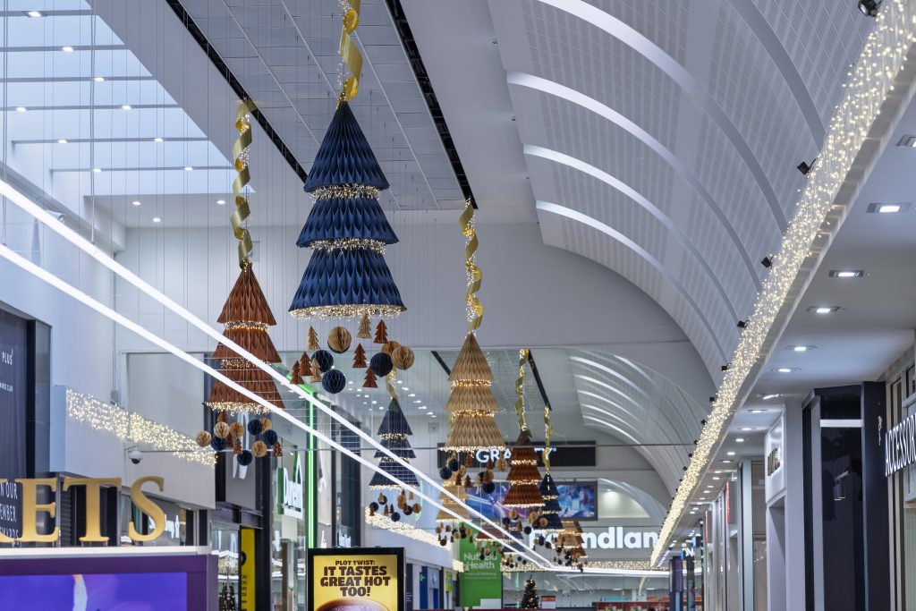 Christmas Unfolds: hanging folded Christmas tree decorations in Southside, London